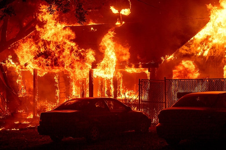 A home burns as the Camp Fire tears through Paradise, California on Nov. 8.